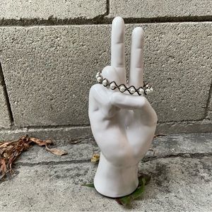 Vintage. Brass and a faux Pearl Wave Pattern Bangle